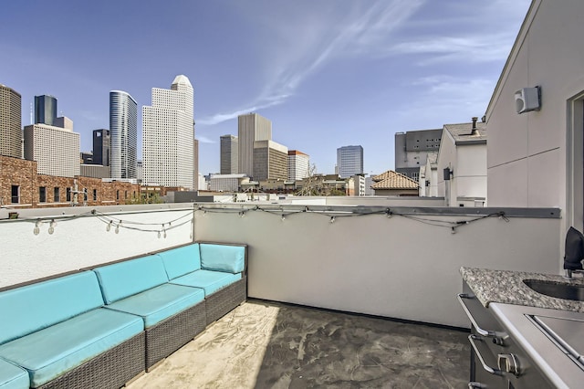 view of patio with a city view and outdoor lounge area