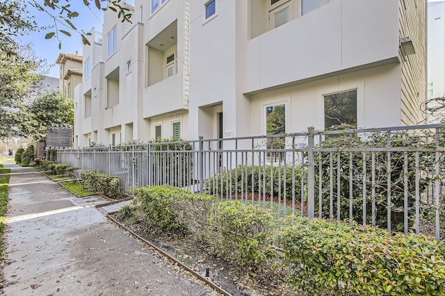 view of property featuring fence