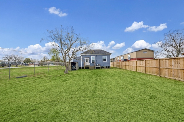 view of yard featuring a fenced backyard