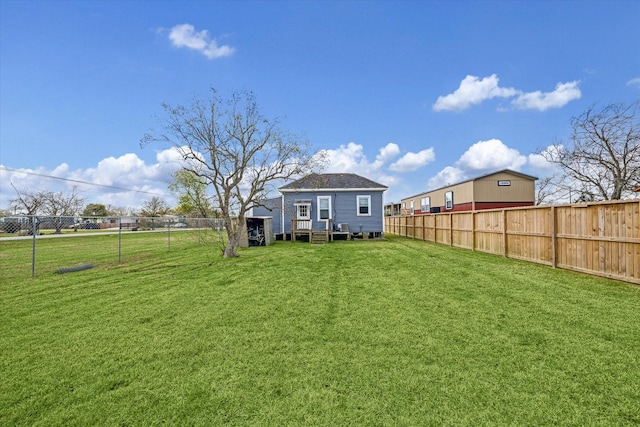 view of yard featuring a fenced backyard
