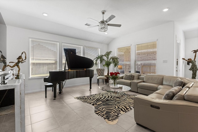 living area with light tile patterned floors, baseboards, ceiling fan, and recessed lighting