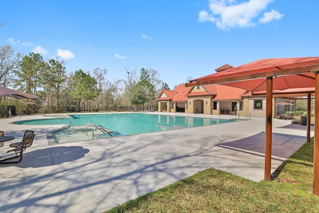 community pool featuring a patio