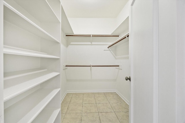 walk in closet featuring tile patterned floors