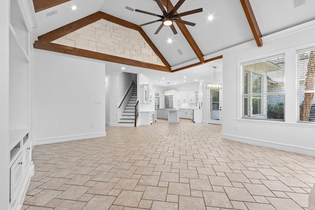 unfurnished living room featuring stairway, visible vents, baseboards, high vaulted ceiling, and ceiling fan with notable chandelier