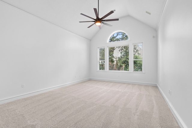 carpeted spare room featuring baseboards, visible vents, high vaulted ceiling, and ceiling fan