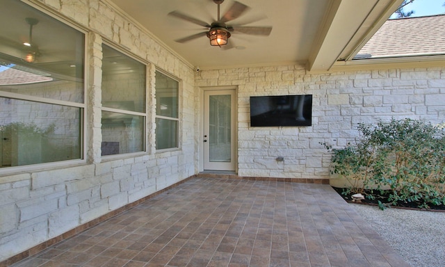 view of patio with ceiling fan