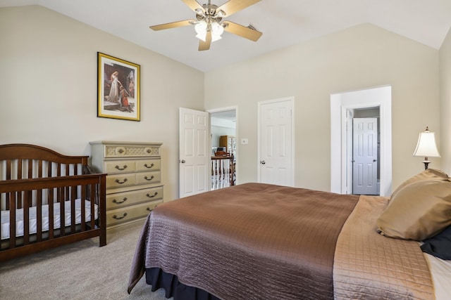 carpeted bedroom featuring a ceiling fan and lofted ceiling