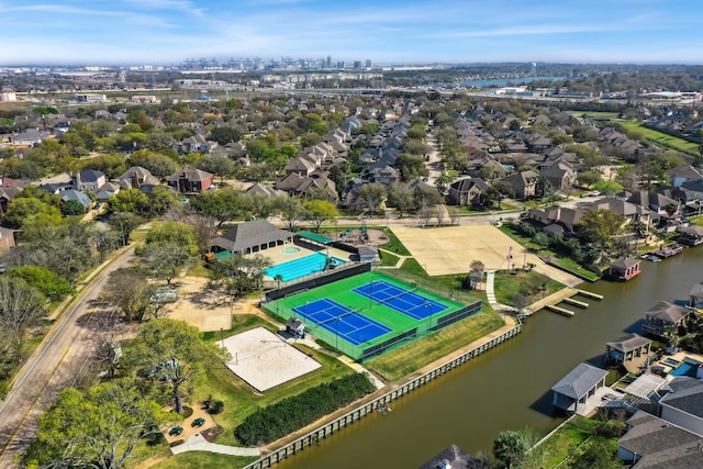 bird's eye view with a residential view and a water view