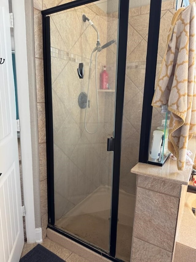 bathroom featuring a stall shower