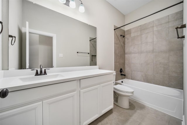 full bath with vanity, toilet,  shower combination, and tile patterned flooring