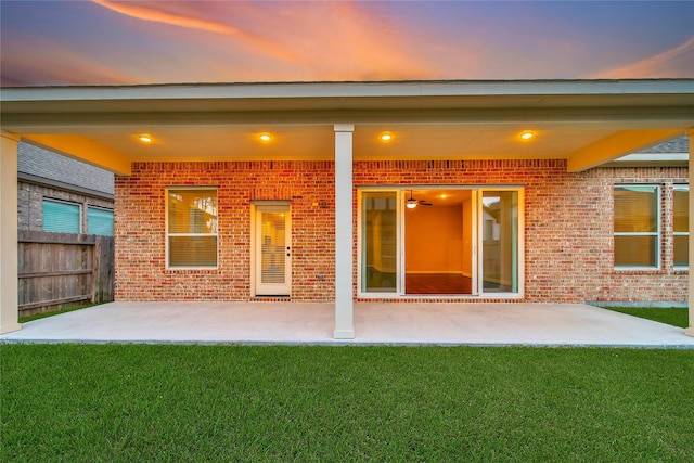 32193 Park Plains Dr, Conroe, TX 77385 - rear view of property featuring brick siding and a patio area