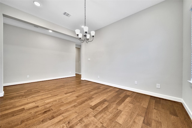 32193 Park Plains Dr, Conroe, TX 77385 - spare room featuring baseboards, a chandelier, wood finished floors, and recessed lighting