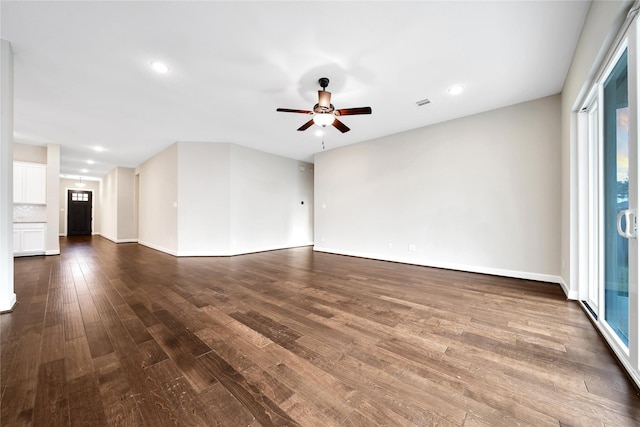 32193 Park Plains Dr, Conroe, TX 77385 - unfurnished living room featuring ceiling fan, wood finished floors, baseboards, and recessed lighting