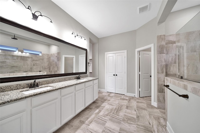 32193 Park Plains Dr, Conroe, TX 77385 - full bath featuring a walk in shower, double vanity, marble finish floors, and baseboards