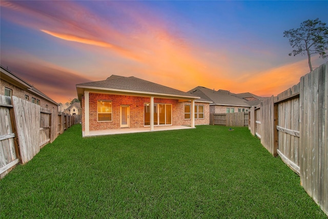 32193 Park Plains Dr, Conroe, TX 77385 - back of property featuring brick siding and a patio