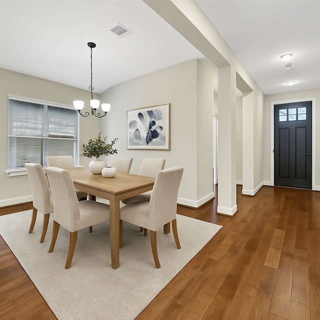 32193 Park Plains Dr, Conroe, TX 77385 - dining room with dark wood-style floors, baseboards, and plenty of natural light