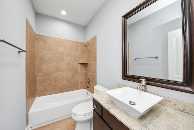 full bathroom with tile patterned flooring, vanity, toilet, and shower / tub combination