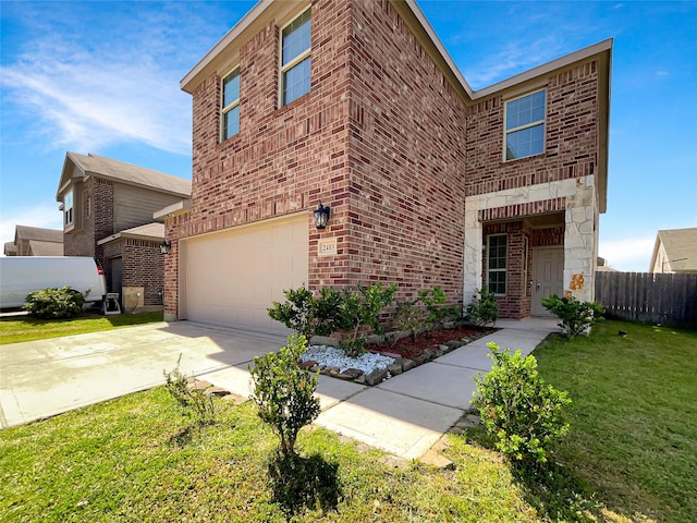 traditional home featuring brick siding, fence, concrete driveway, a front yard, and a garage