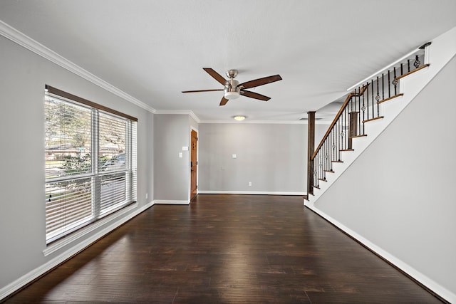 unfurnished living room featuring a ceiling fan, wood finished floors, stairway, crown molding, and baseboards