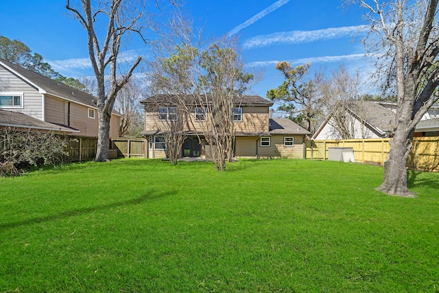 view of yard featuring a fenced backyard