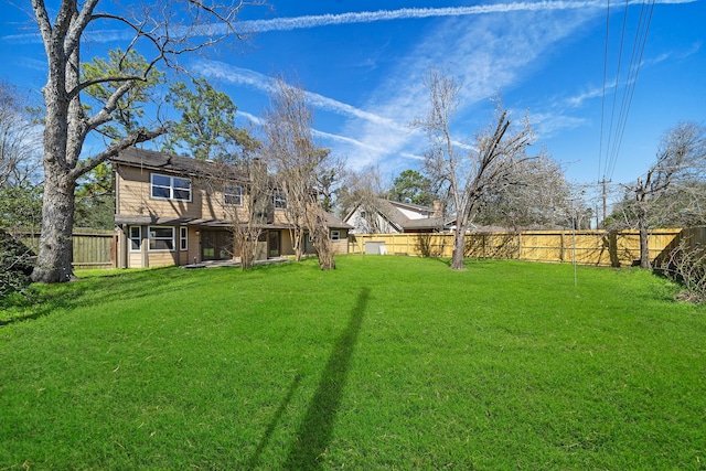 view of yard featuring a fenced backyard