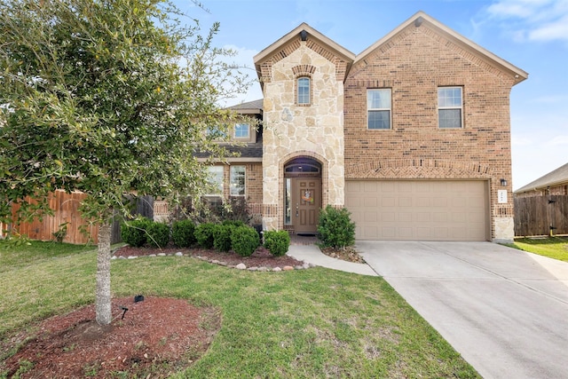 view of front of home featuring a front yard, brick siding, and driveway