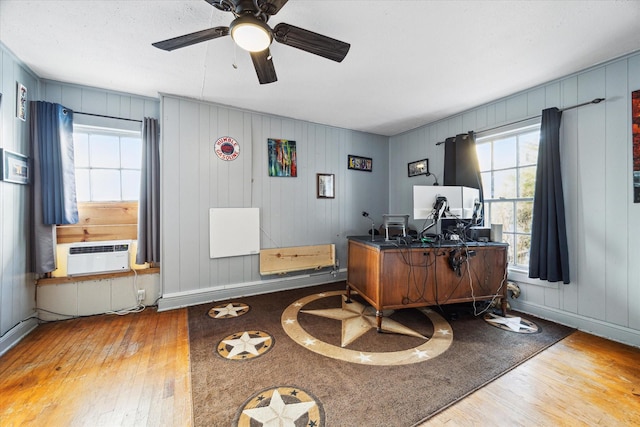 office area with hardwood / wood-style flooring, baseboards, and ceiling fan