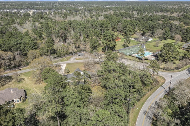 drone / aerial view with a view of trees