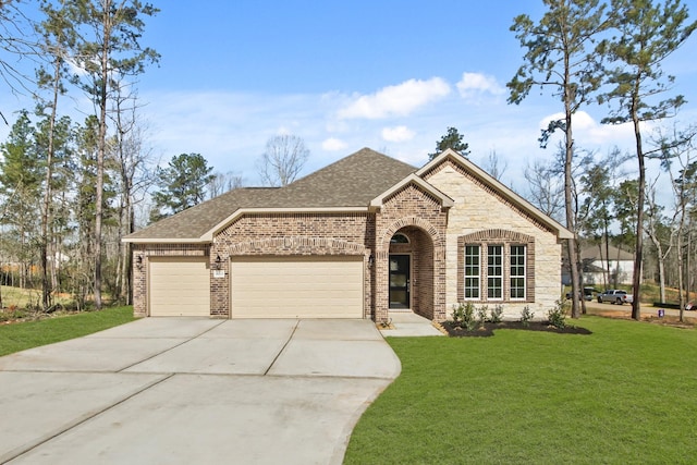 view of front facade with driveway, a front lawn, a shingled roof, a garage, and brick siding