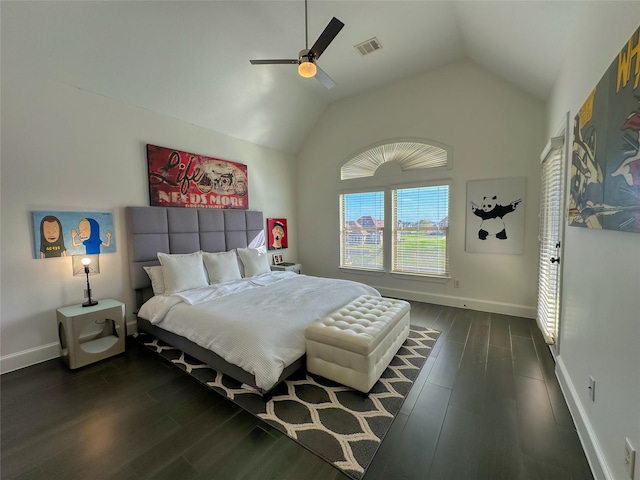 bedroom featuring visible vents, lofted ceiling, baseboards, and dark wood-style floors