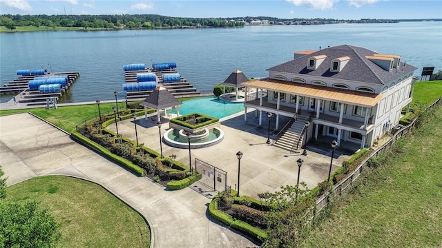 birds eye view of property featuring a water view