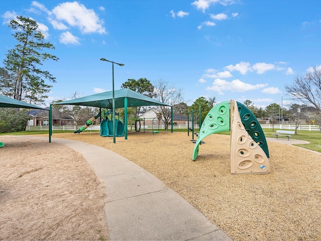 community play area featuring fence