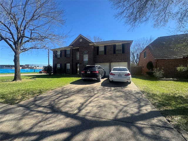 view of front of property with a front yard, concrete driveway, brick siding, and a garage