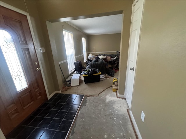 entryway featuring baseboards