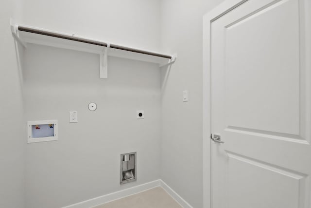 laundry area featuring baseboards, hookup for an electric dryer, laundry area, washer hookup, and hookup for a gas dryer