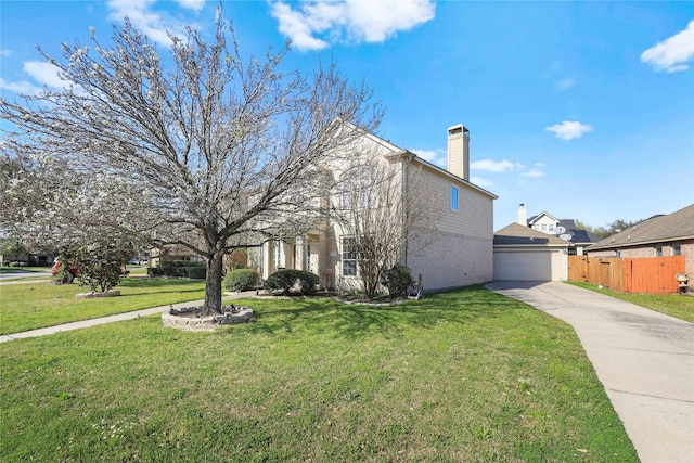 traditional home featuring driveway, a chimney, a front lawn, and fence