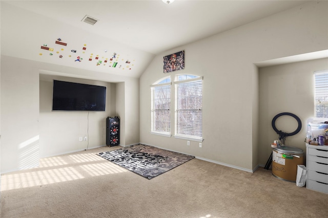 living room with visible vents, baseboards, lofted ceiling, and carpet