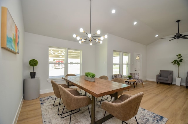 dining area with recessed lighting, baseboards, lofted ceiling, and light wood finished floors