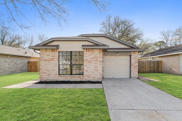 view of front facade with brick siding, concrete driveway, a front lawn, and fence