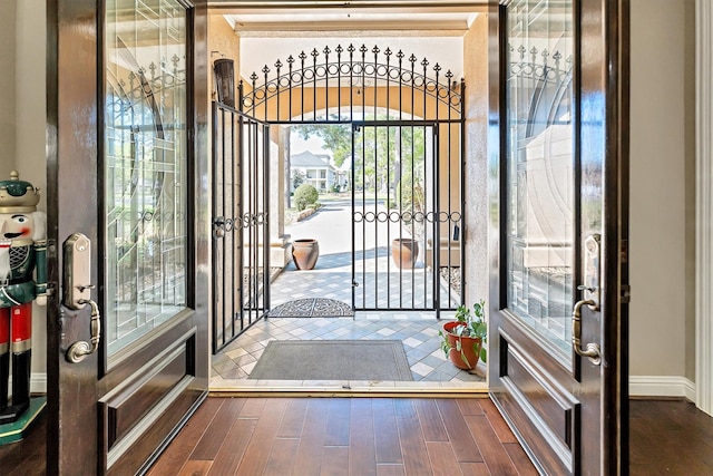 entrance foyer with dark wood-style floors