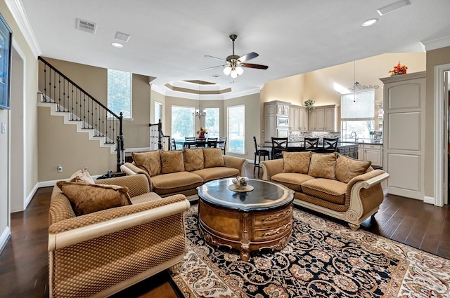 living room featuring visible vents, a ceiling fan, recessed lighting, baseboards, and dark wood-style flooring