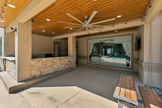 view of patio / terrace with a ceiling fan