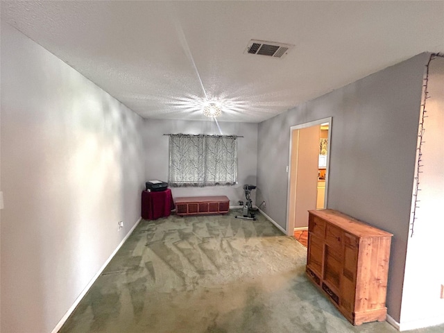 unfurnished bedroom with visible vents, baseboards, and carpet