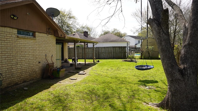 view of yard featuring a fenced backyard