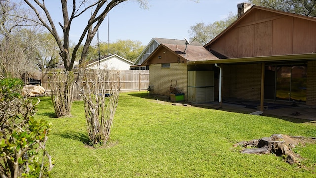 view of yard with fence