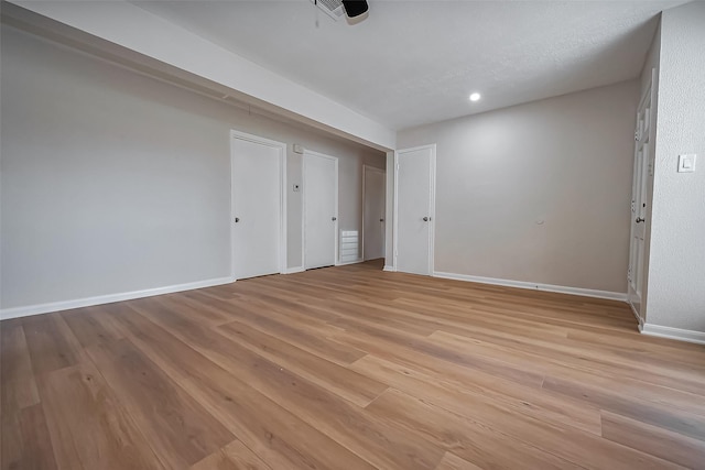 interior space featuring recessed lighting, visible vents, baseboards, and light wood-style floors