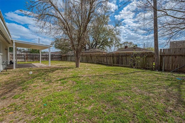 view of yard with a patio and a fenced backyard