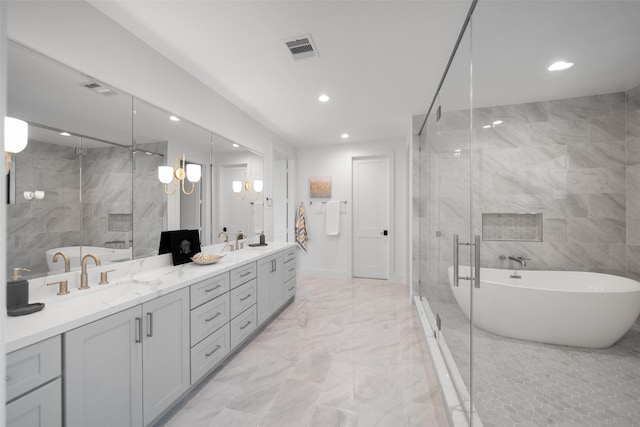 bathroom featuring visible vents, a soaking tub, marble finish floor, and a stall shower