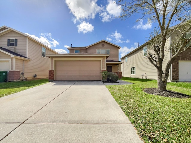 view of front of house with a front yard, a garage, brick siding, and driveway