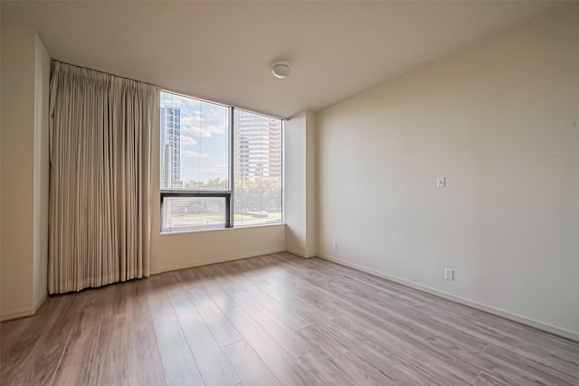 empty room with light wood-style floors